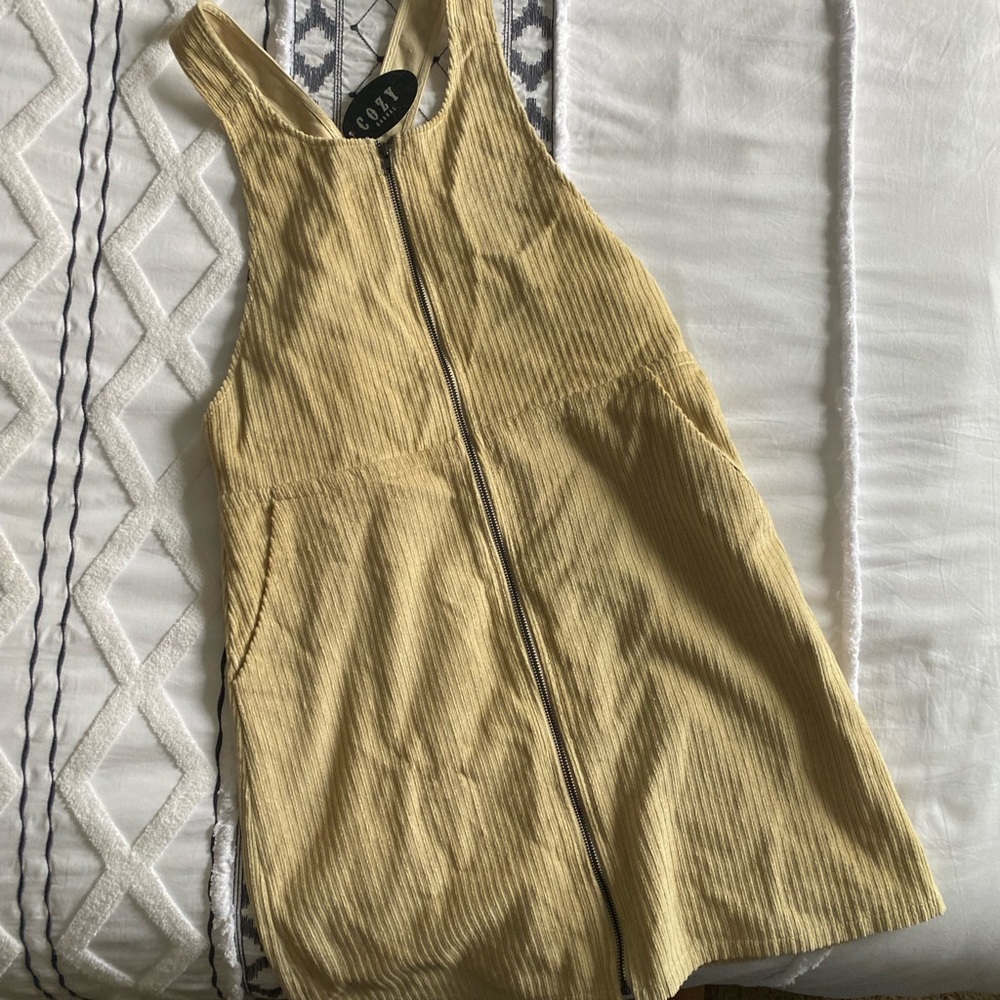 Corduroy dress. Zip up, tags on. Brand new!